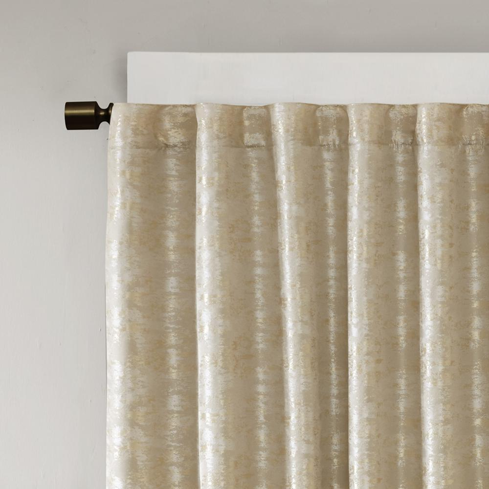 Black blackout curtain panel with jacquard lining, rod pocket and back tab design from Start2Finish, shown hanging on a window.