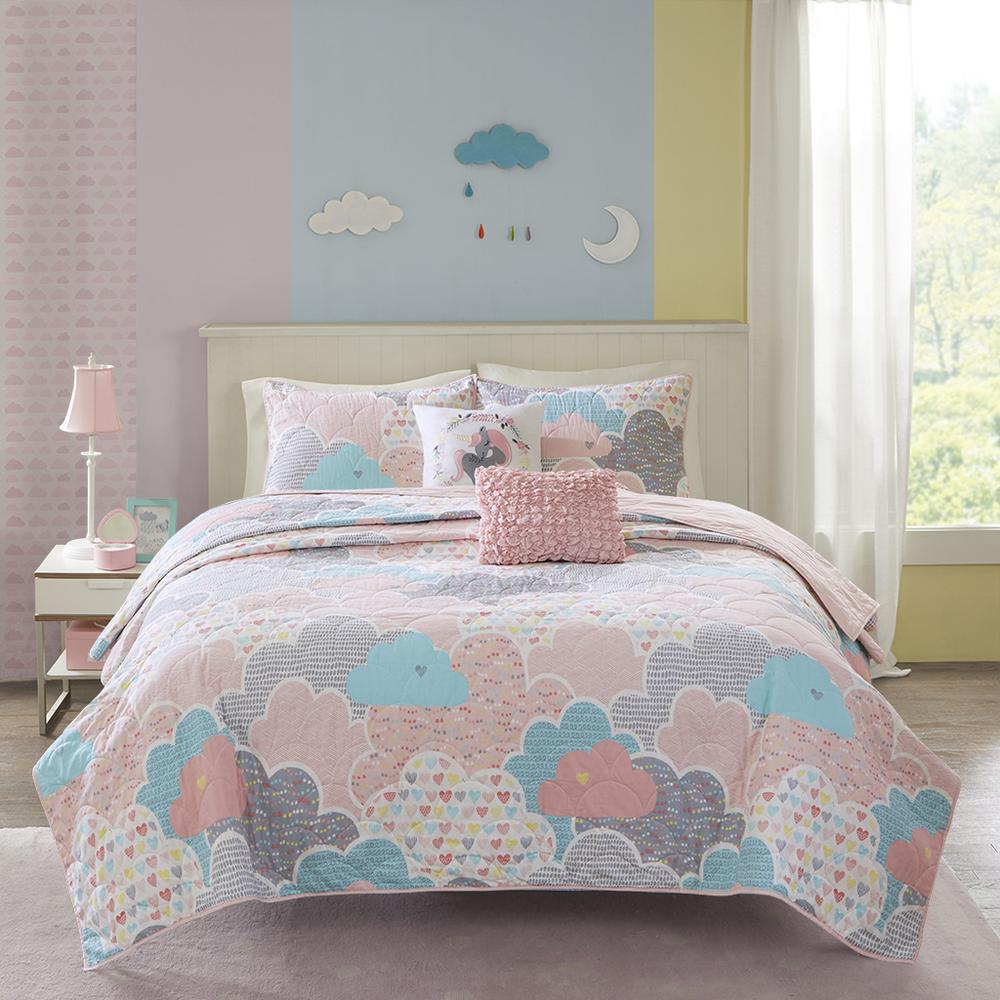 Reversible cotton quilt set with matching throw pillows, Start2Finish bedding in soft, neutral tones, displayed on a neatly made bed.