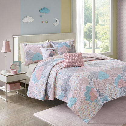 Reversible cotton quilt set with matching throw pillows from Start2Finish, showing cozy bedding with a layered, inviting look.