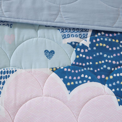 Reversible cotton quilt set with matching throw pillows by Start2Finish, featuring a cozy, patterned bedding design.