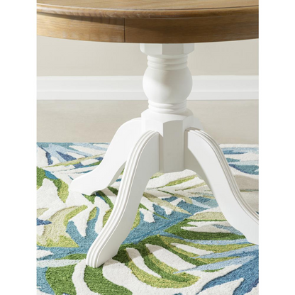 Start2Finish Tobin Pedestal Dining Table with natural wood top and white base, showcasing a modern, stylish design.
