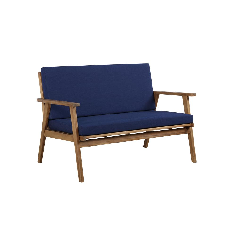 Cole Outdoor Chat 4-piece furniture set by Start2Finish with blue cushions, featuring a sofa, chairs, and a coffee table.