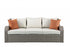 Gray wicker patio sectional and ottoman set by Jade, featuring comfortable outdoor furniture for garden or patio lounging.