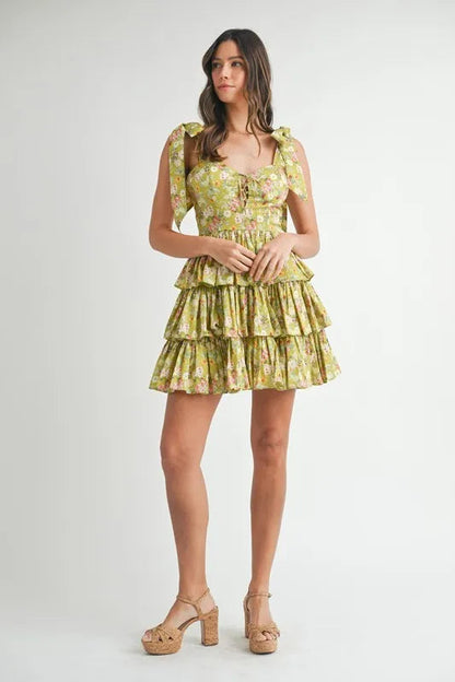 Pear Daisy MABLE floral print shoulder tie layered mini dress, stylish home and garden decor with vibrant floral accents.