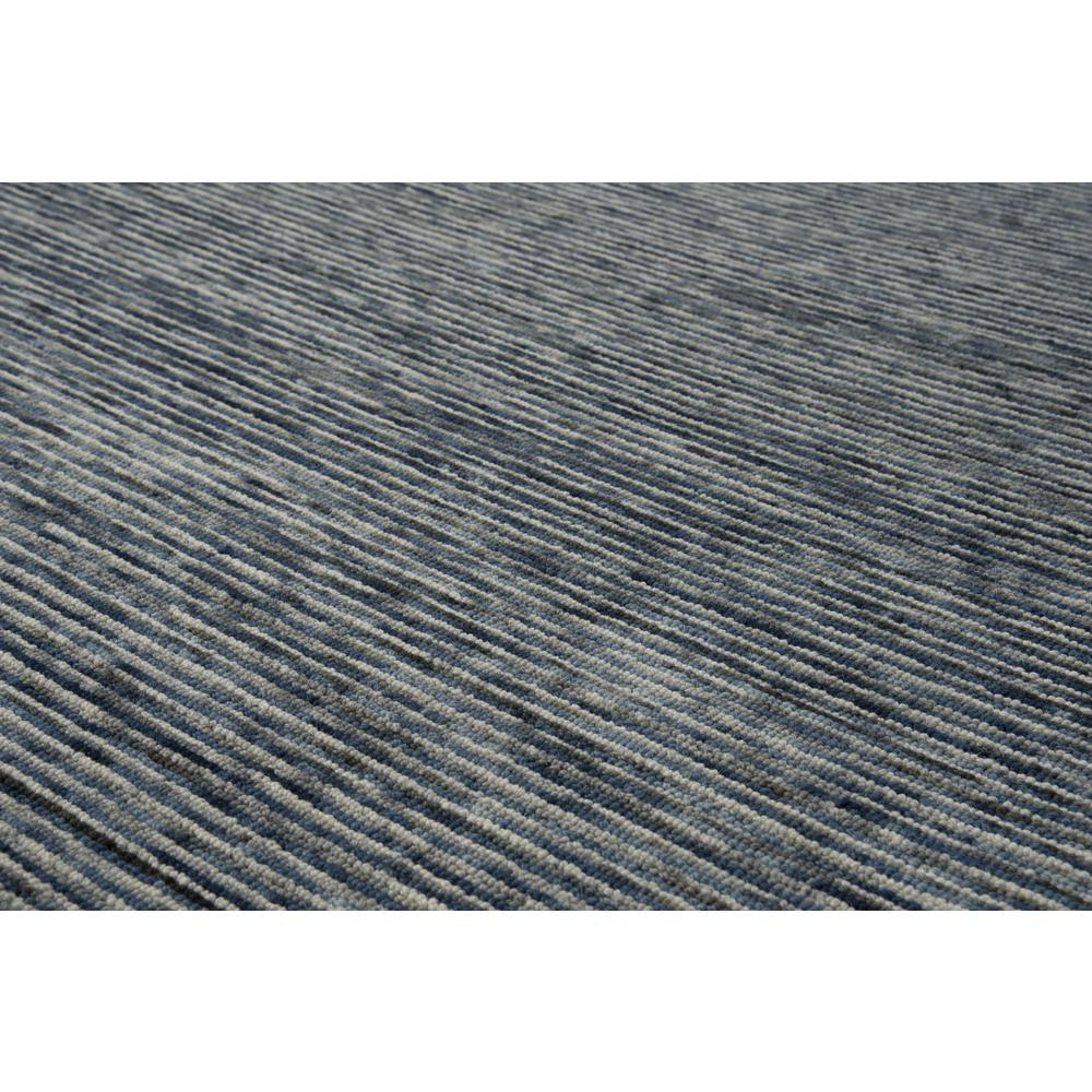 Hand-tufted 5x8 rectangular rug by Start2Finish with intricate patterns and soft, plush texture for living room or bedroom decor.