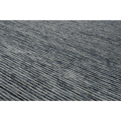 Hand-tufted 5x8 rectangular rug by Start2Finish with intricate patterns and soft, plush texture for living room or bedroom decor.