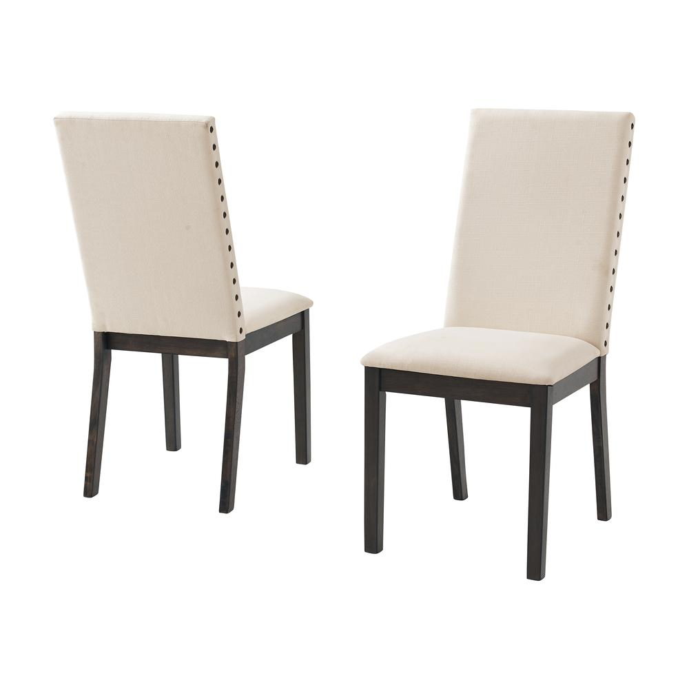 Two upholstered dining chairs from the Hayden 2-Piece Upholstered Dining Chair Set by Start2Finish, featuring fabric seats and wooden legs.
