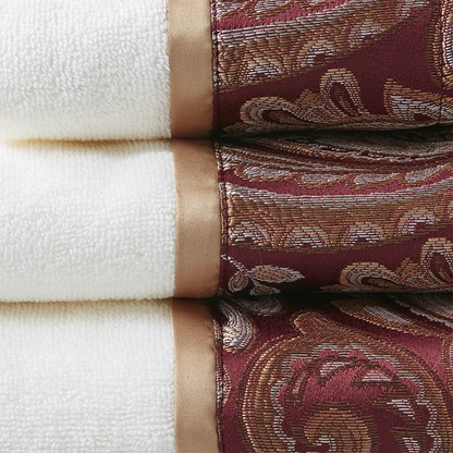 Set of six Start2Finish jacquard bath towels with intricate woven patterns in soft, absorbent fabric for luxurious bathroom use.