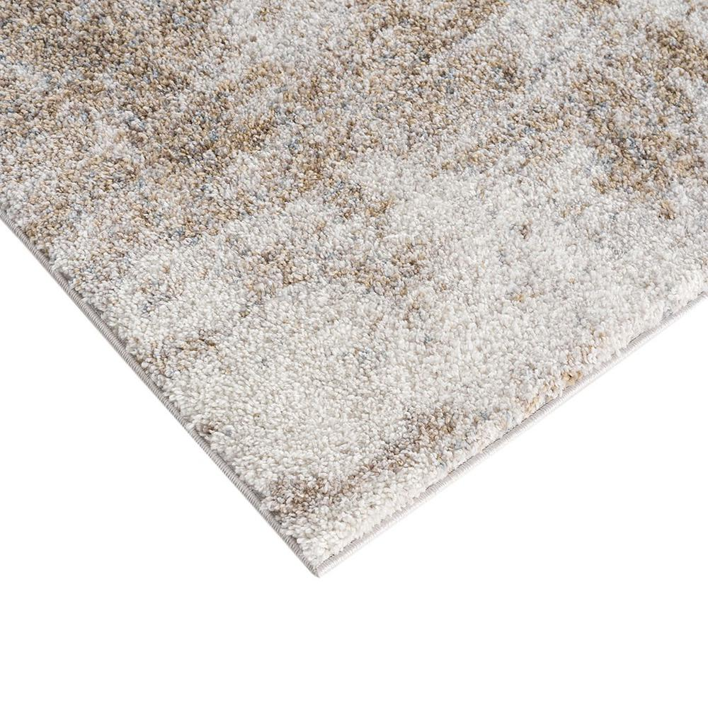 Close-up of a Cozy Shag Abstract Area Rug by Start2Finish with plush, textured shag fibers and a modern abstract pattern in neutral tones.