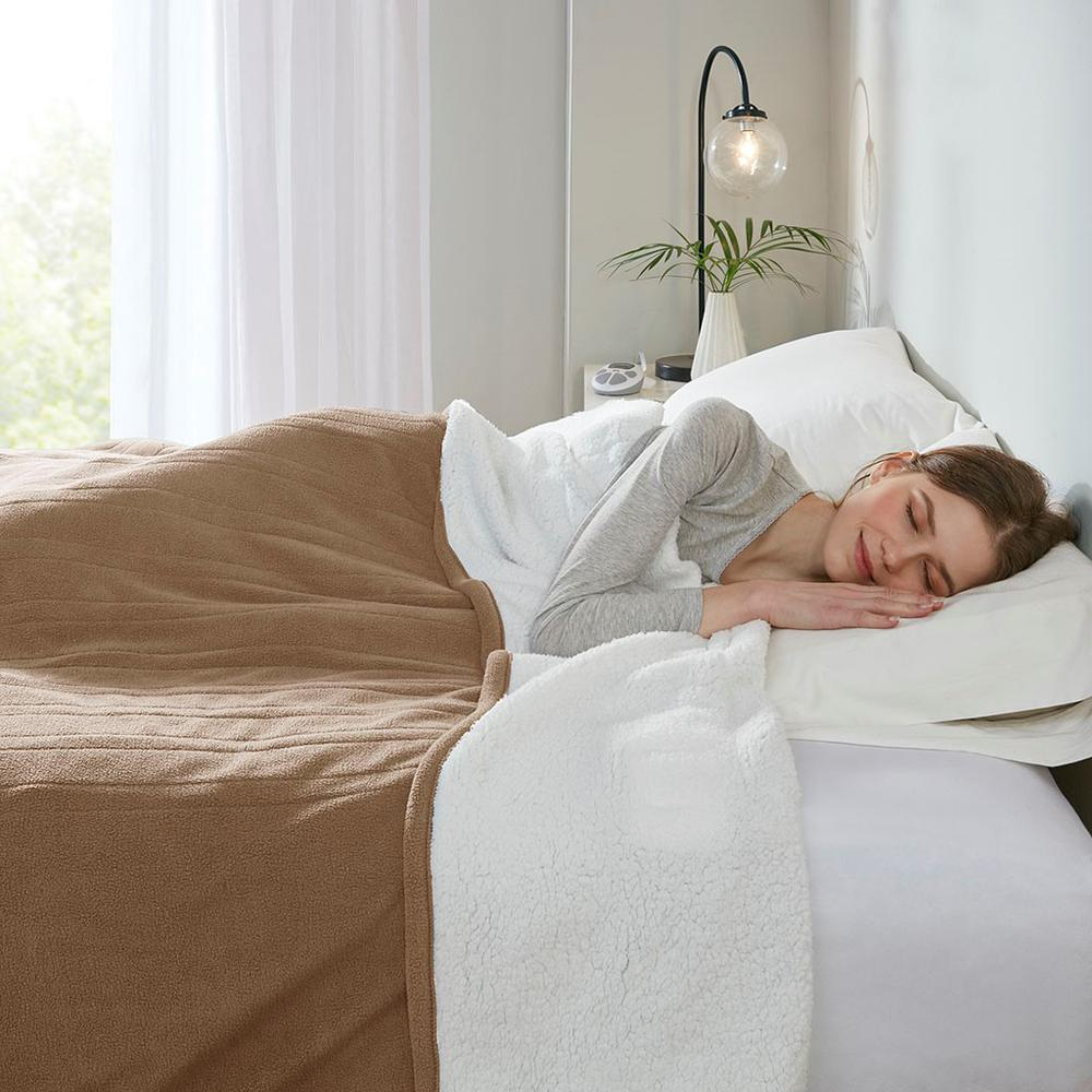 Start2Finish heated blanket with plush fabric, showing a close-up of the soft, cozy material and control button for adjustable warmth.
