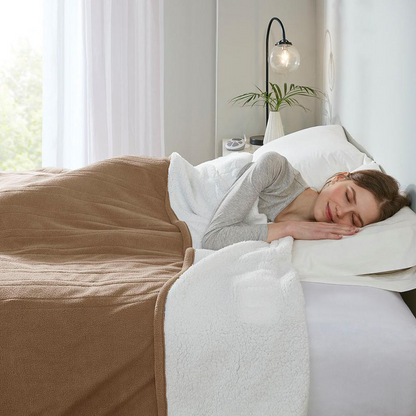 Start2Finish heated blanket with plush fabric, showing a close-up of the soft, cozy material and control button for adjustable warmth.