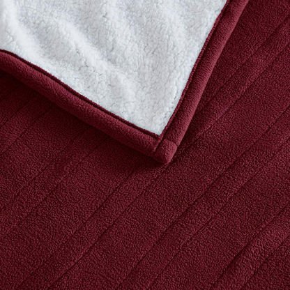 Start2Finish heated blanket shown spread out with soft, plush fabric and control panel for adjustable warmth.