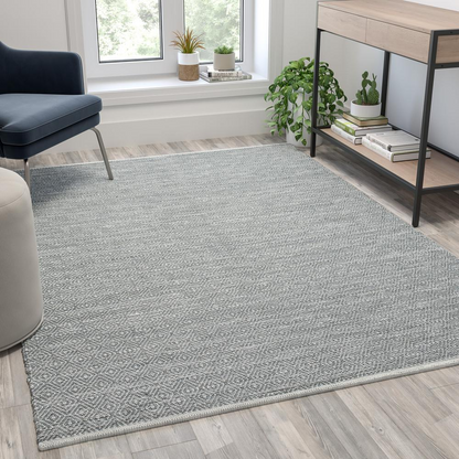 Start2Finish 5x7 foot grey handwoven indoor/outdoor diamond pattern area rug, showcasing detailed woven texture and modern design.