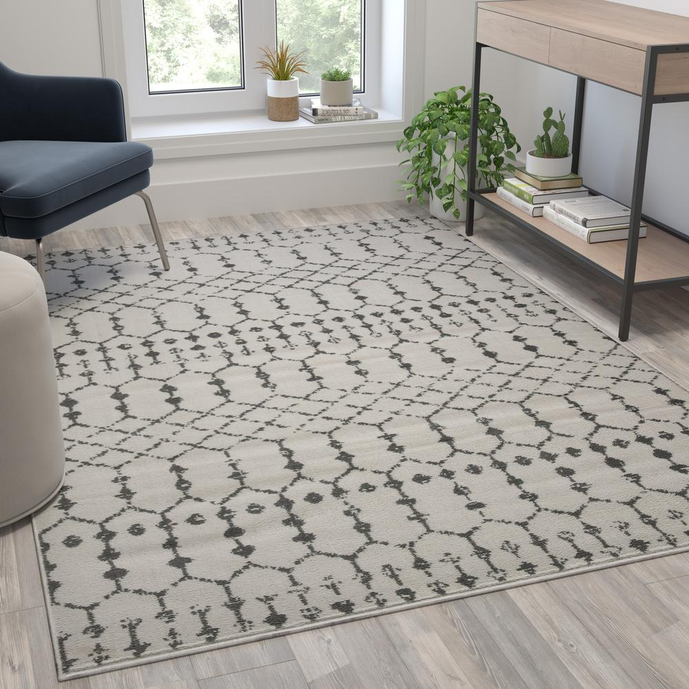 Start2Finish geometric bohemian low pile rug in ivory and gray polyester, 5x7 feet with a modern, abstract pattern.