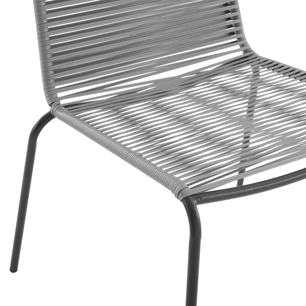 Fenton 5-piece wicker outdoor dining set with table and four chairs, featuring sturdy frames and woven wicker design.