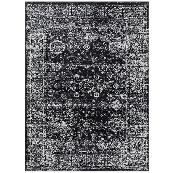 Distressed vintage Persian woven area rug with intricate patterns and earthy tones from Start2Finish, showing detailed woven texture.