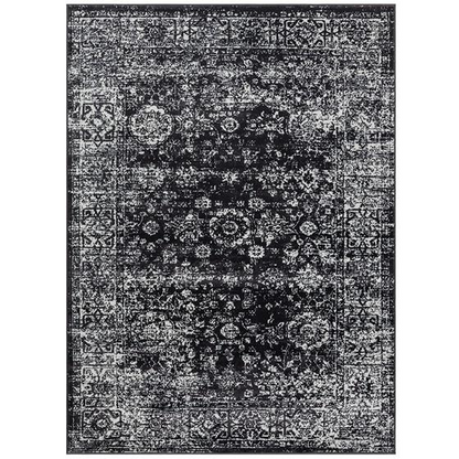 Distressed vintage Persian woven area rug with intricate patterns and earthy tones from Start2Finish, showing detailed woven texture.