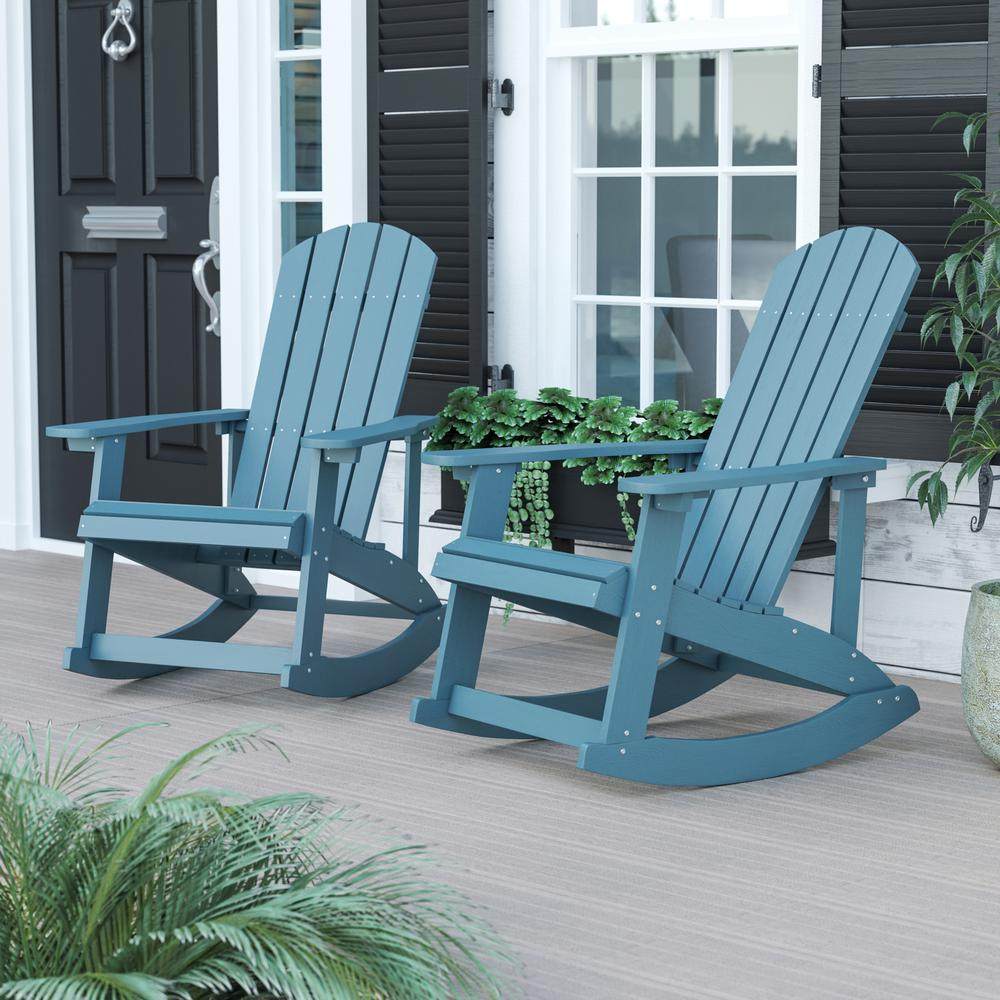 Pair of Start2Finish Adirondack rocking chairs in sea foam, featuring wide armrests and slatted backrests for outdoor relaxation.