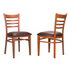 Set of two Start2Finish Baxter metal side chairs in honey burgundy with curved backs and metal frame detailing.