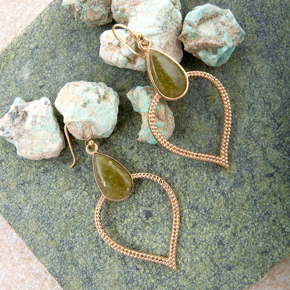 Green Jasper Bedouin Golden Drop Earrings featuring green jasper stones and gold-plated accents, hanging in a delicate drop design.