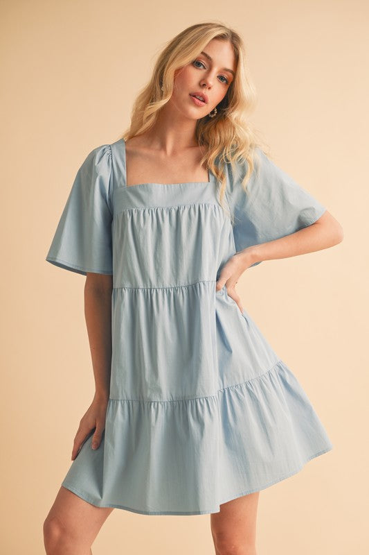 Automotive Jade Icarus Aemi + Co square neck half sleeve tiered dress, featuring a stylish tiered design and square neckline.