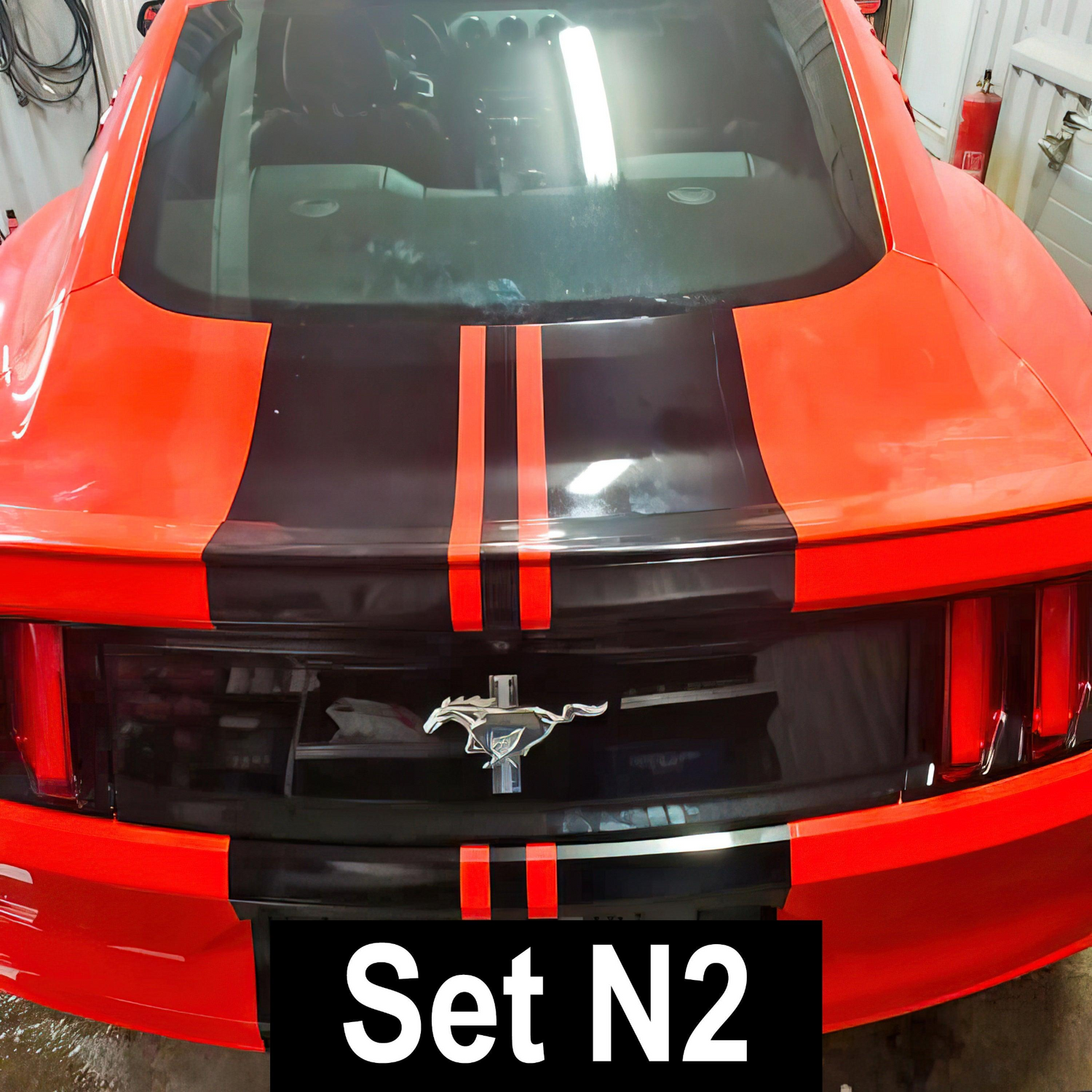 Automotive racing stripe vinyl decals set by Start2Finish with bold black and white racing stripes for vehicle customization.