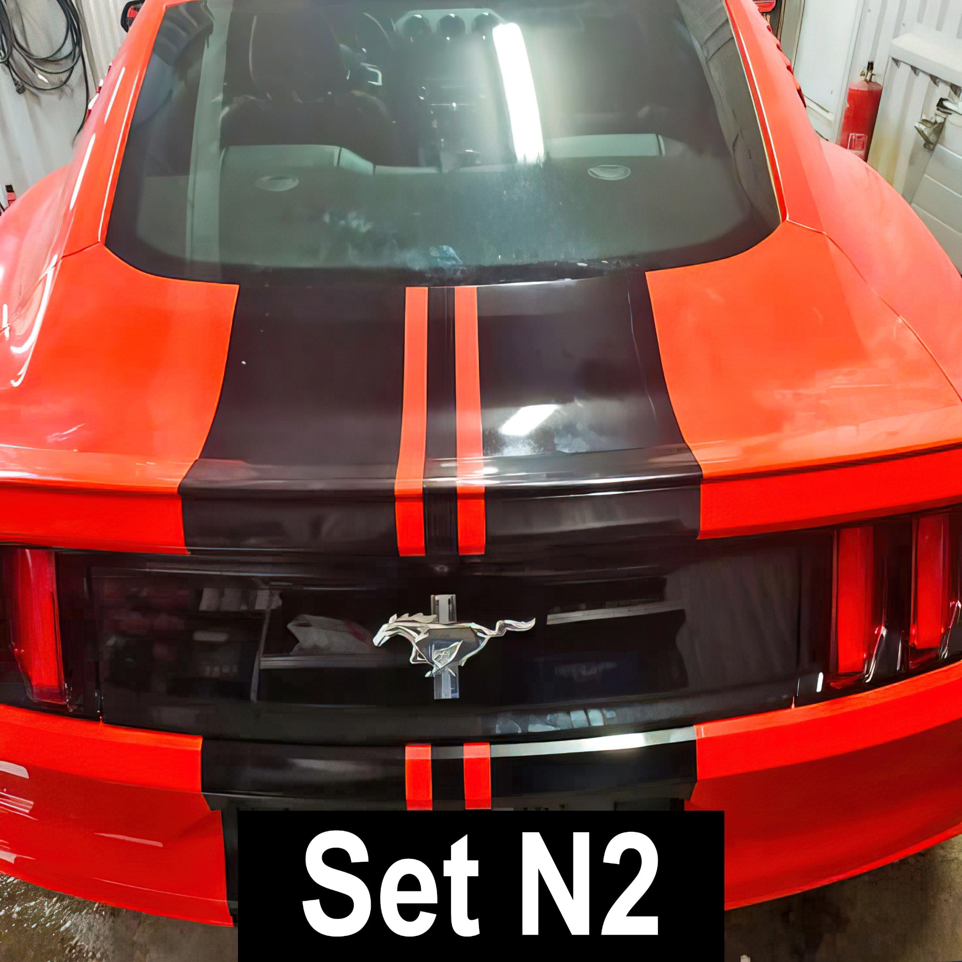 Automotive racing stripe vinyl decals set by Start2Finish with bold black and white racing stripes for vehicle customization.