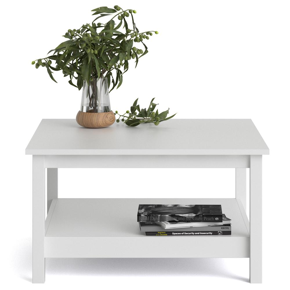 White Madrid coffee table by Start2Finish, modern rectangular furniture piece with sleek legs and smooth surface.