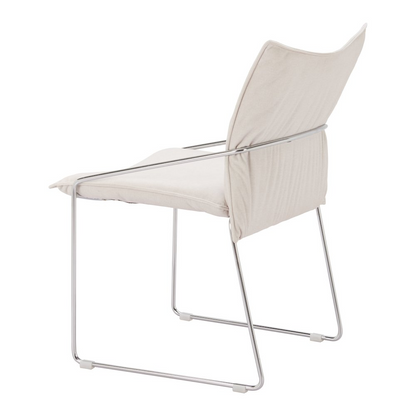 Pair of white Pola dining chairs by Start2Finish, featuring sleek modern design and comfortable upholstered seats.