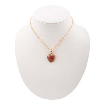 Hearts of Love Red Magnesite golden pendant necklace featuring a heart-shaped magnesite pendant with gold-tone chain jewelry.