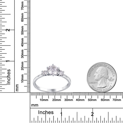 Sterling silver white moissanite 3-stone ring with sparkling gemstones, elegant jewelry by Copper Juniper.