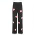 Carmine Juneberry UrbanEase™ fashionable women’s jeans with love print design showcasing stylish denim pants.