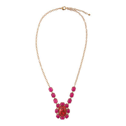 Dual red magnesite and pink quartz gold statement necklace with intricate jewelry design, featuring bold gemstone accents.