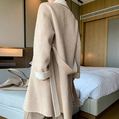 Carmine Juneberry ladies wool double-faced coat showing a classic, elegant design with cozy warm fabric and tailored fit.