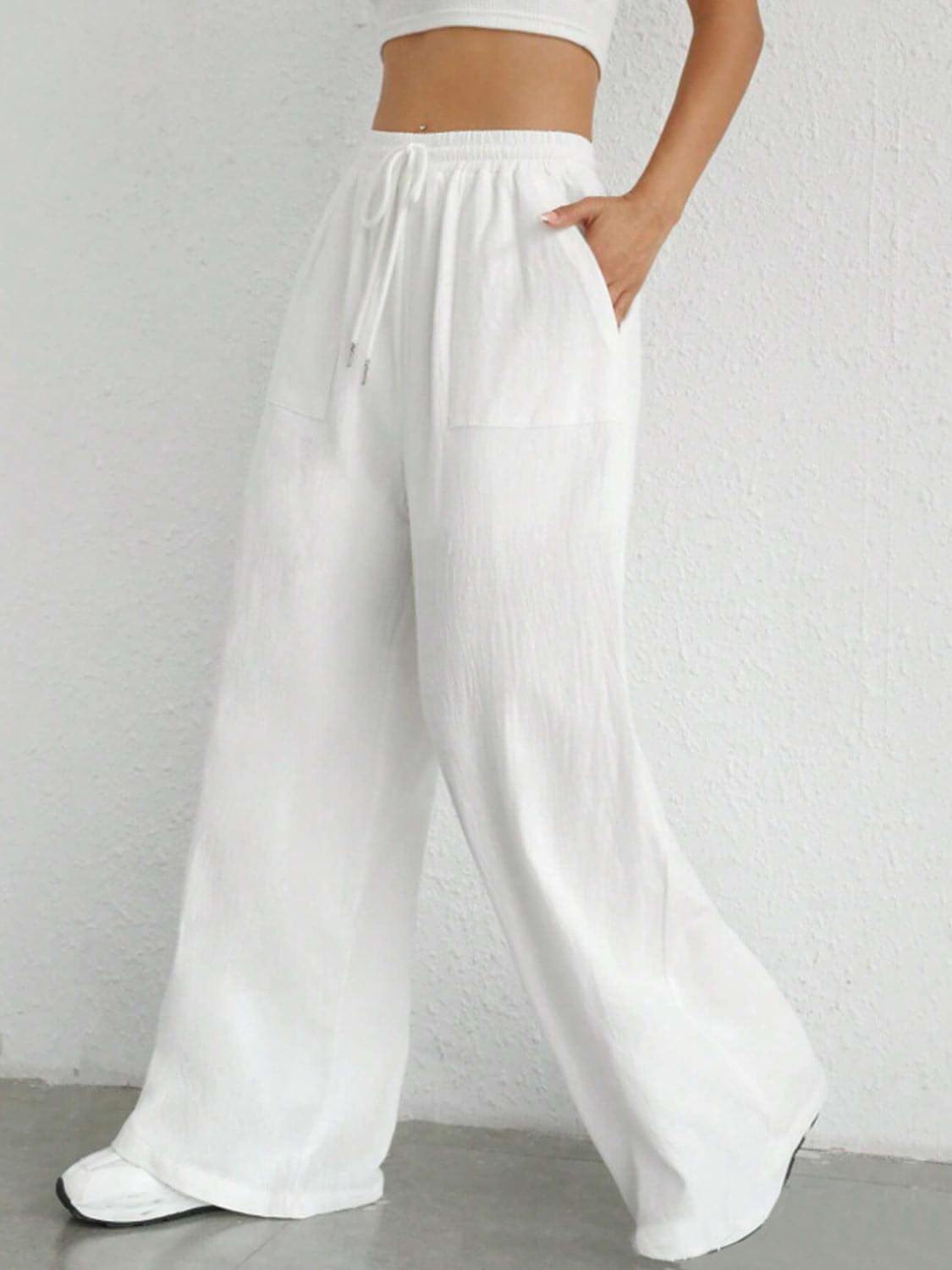 Carmine Juneberry drawstring wide leg pants shown in a relaxed fit with a comfortable waistband and flowing silhouette.