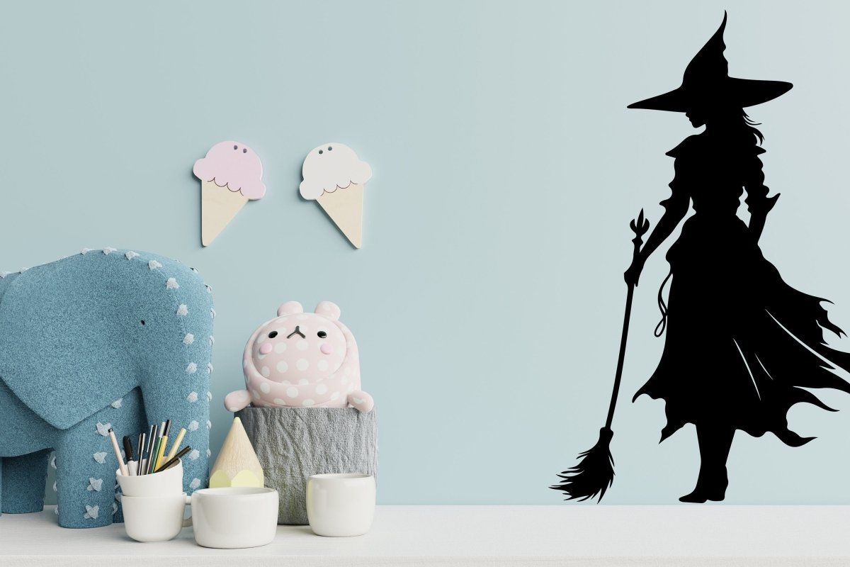 Witch silhouette Halloween decal from Start2Finish, home decor sticker featuring an enchanted witch figure for spooky decorating.