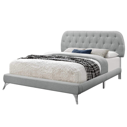 Grey foam and solid wood queen-sized bed by Jade with linen upholstery, measuring 70.5 x 87.25 x 45.25 inches.