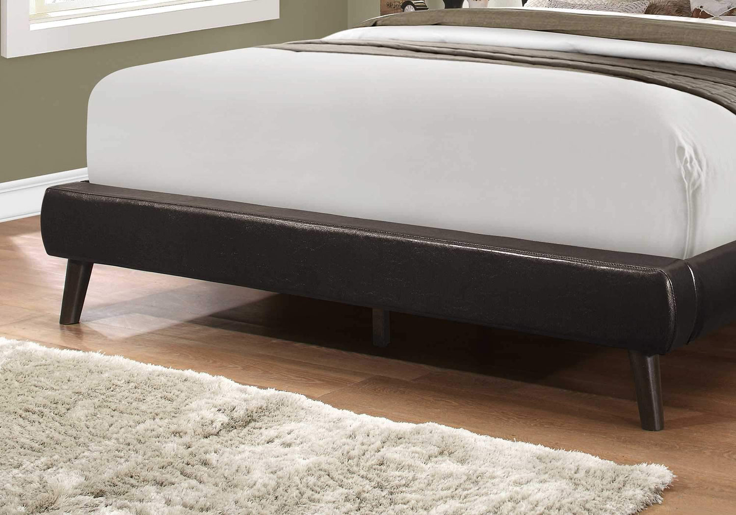 Grey foam and solid wood queen-sized bed by Jade with linen upholstery, measuring 70.5" x 87.25" x 45.25" in the image.