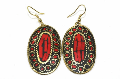 Silver Hestia mosaic oval earrings featuring intricate geometric patterns and a polished silver finish.