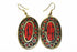 Silver Hestia mosaic oval earrings featuring intricate geometric patterns and a polished silver finish.