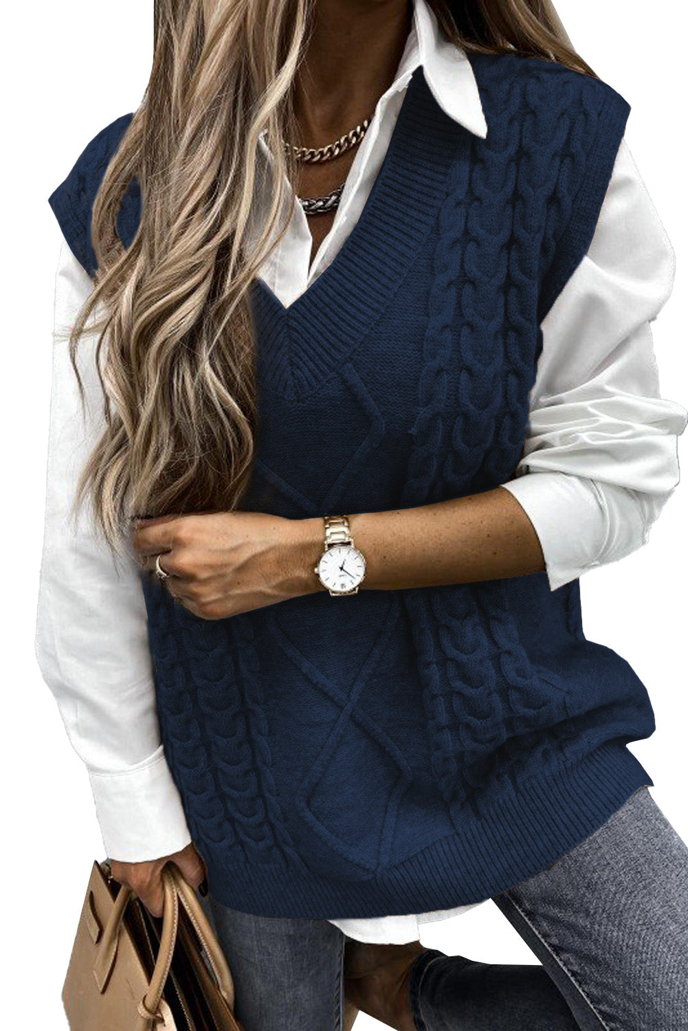 Blue sleeveless cable knitted sweater tank for women by Lavender Pallas, featuring a cozy, stylish knit design.