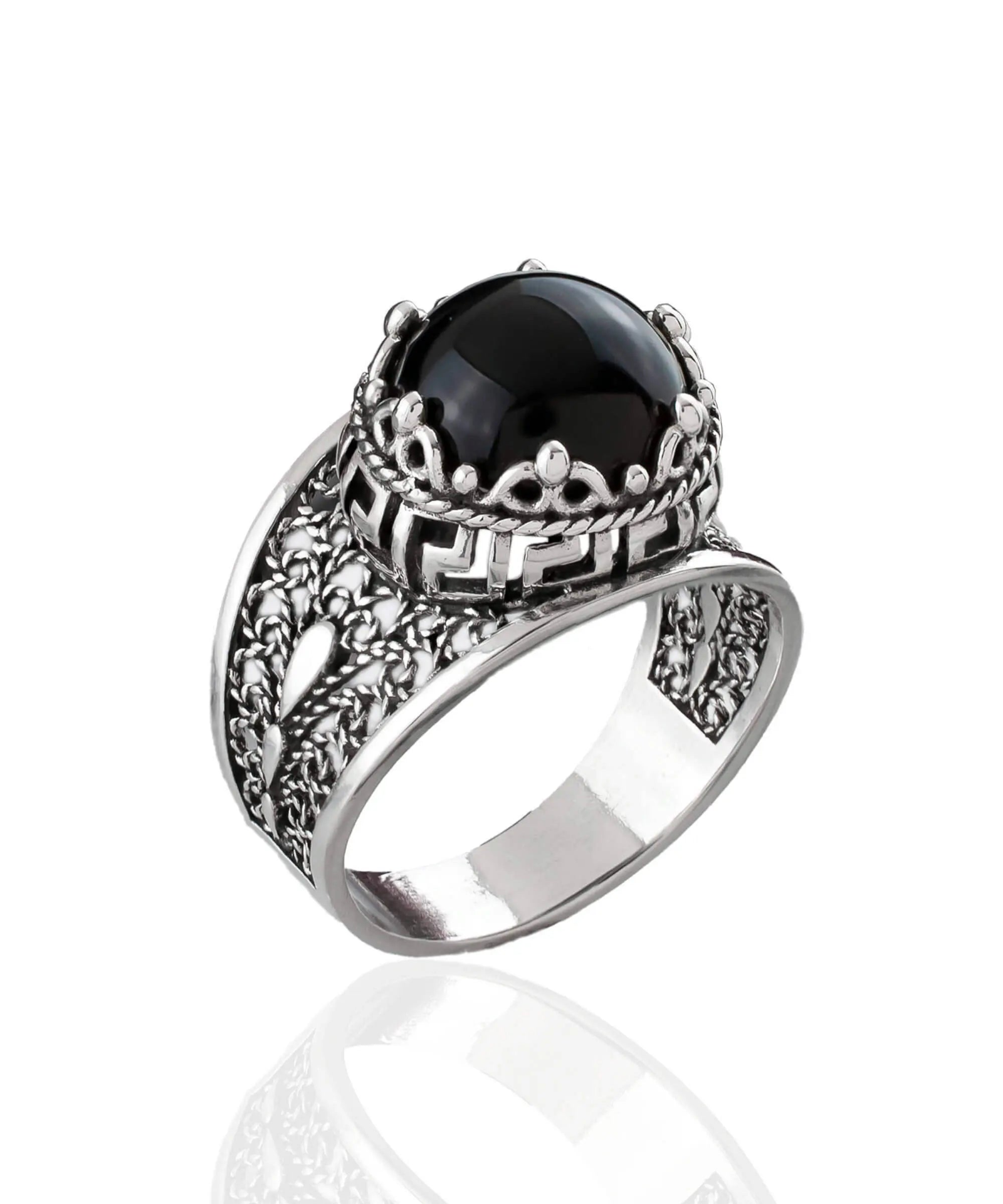 Silver cocktail ring with black onyx gemstone and intricate meander filigree pattern, designed for women.