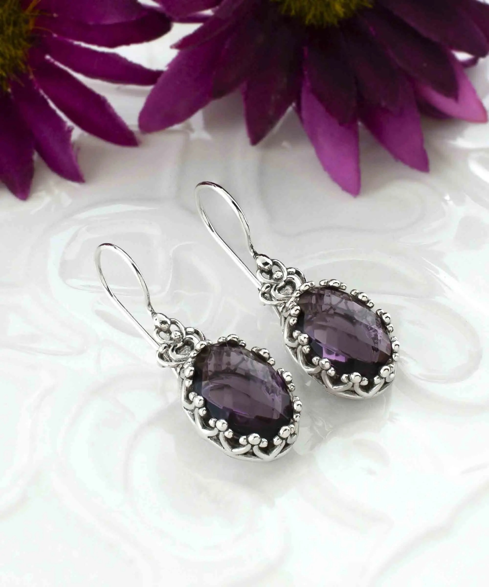 Silver oval drop earrings with filigree design, amethyst gemstone crown, and figured women jewelry by Start2Finish.