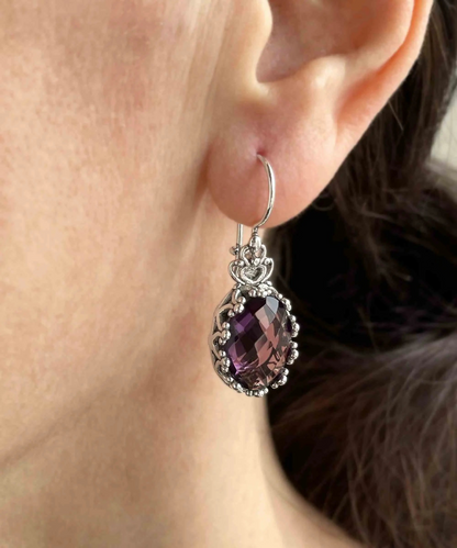 Silver oval drop earrings with filigree art amethyst gemstones and crown-shaped details, designed for women, by Start2Finish jewelry.