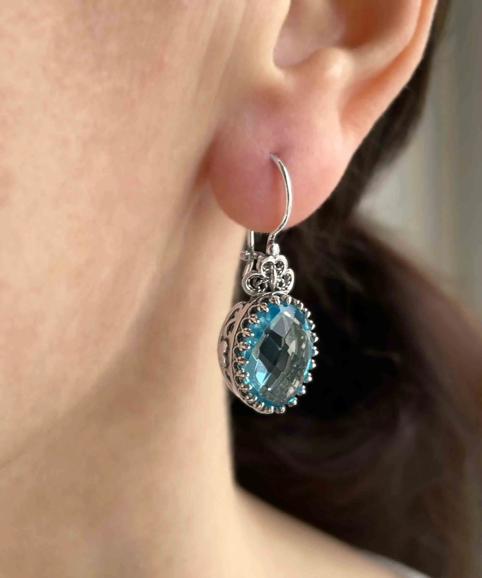 Silver oval drop earrings with filigree design, blue topaz gemstone hearts, detailed women’s jewelry from Start2Finish.