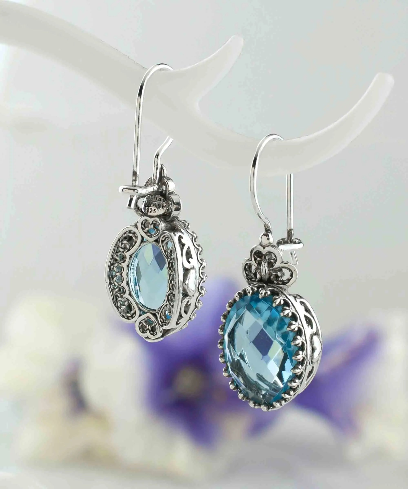 Silver oval drop earrings with filigree design and blue topaz gemstone heart for women, detailed jewelry from Start2Finish.