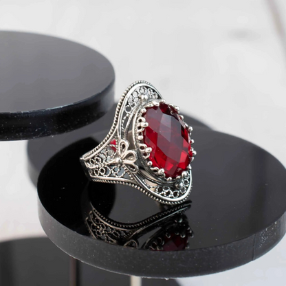 Silver statement ring featuring a Ruby Quartz gemstone with intricate filigree design, designed for women.