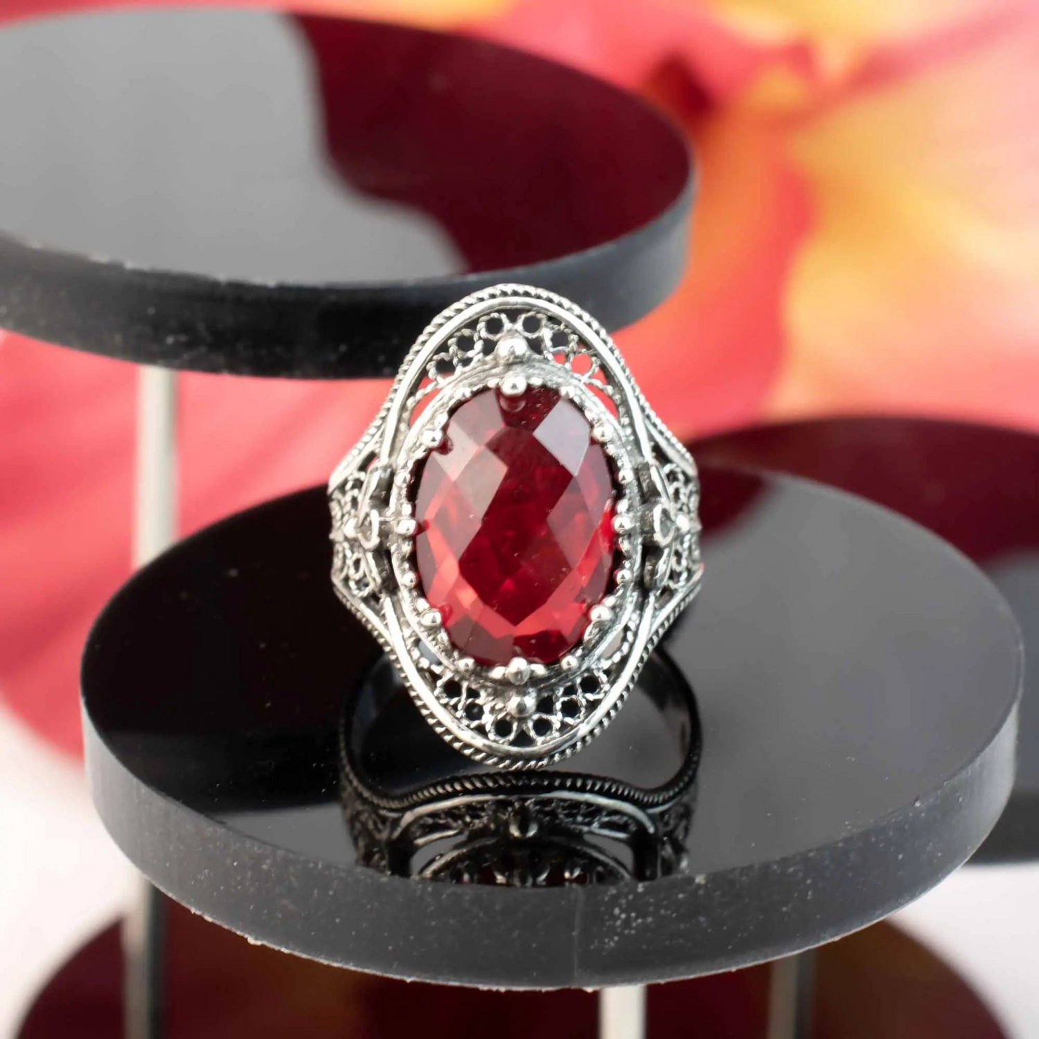 Silver statement ring featuring ruby quartz gemstone and intricate filigree design, crafted for women by Start2Finish jewelry.