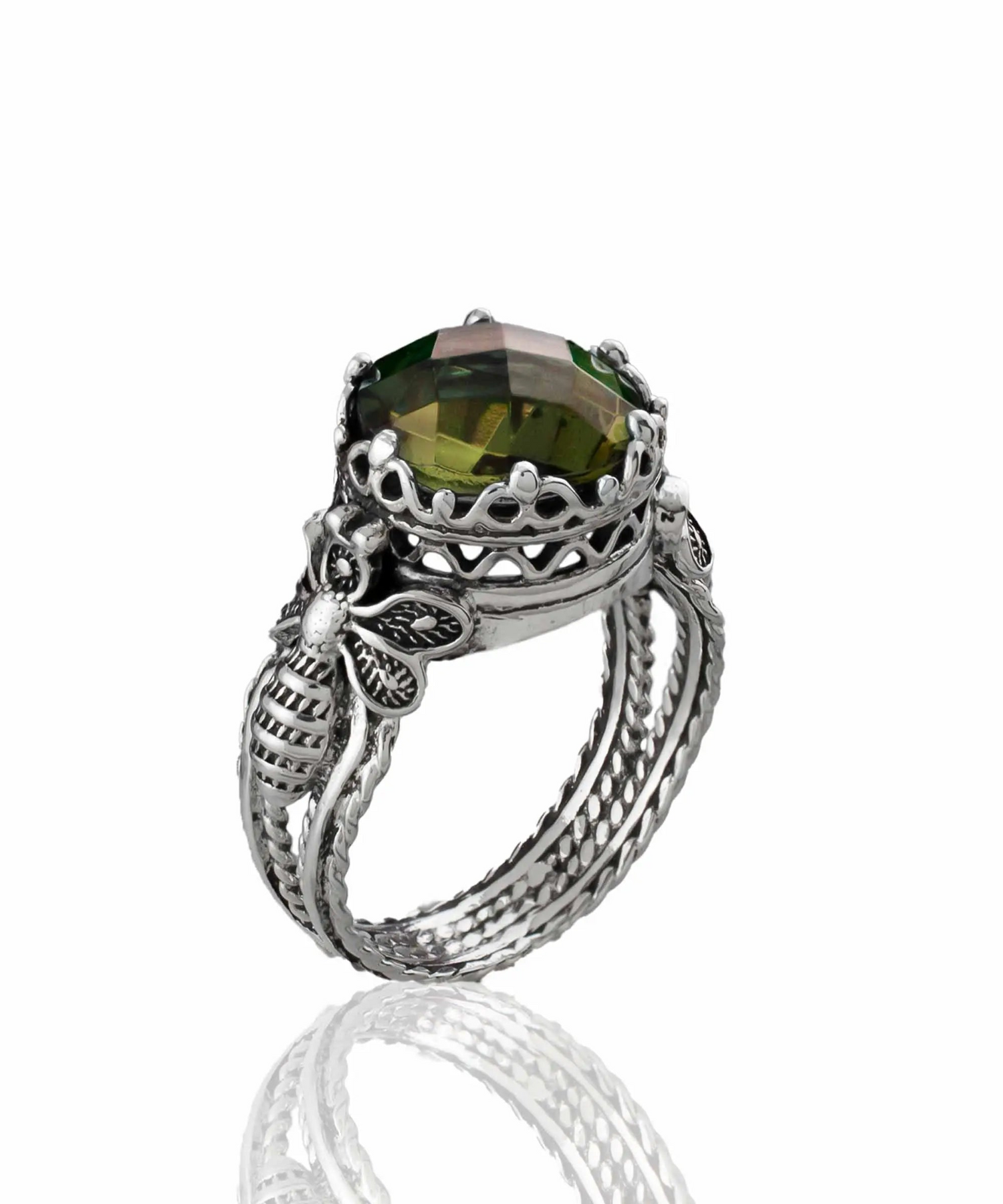 Silver cocktail ring featuring a detailed Alexandrite gemstone with filigree art design for women.