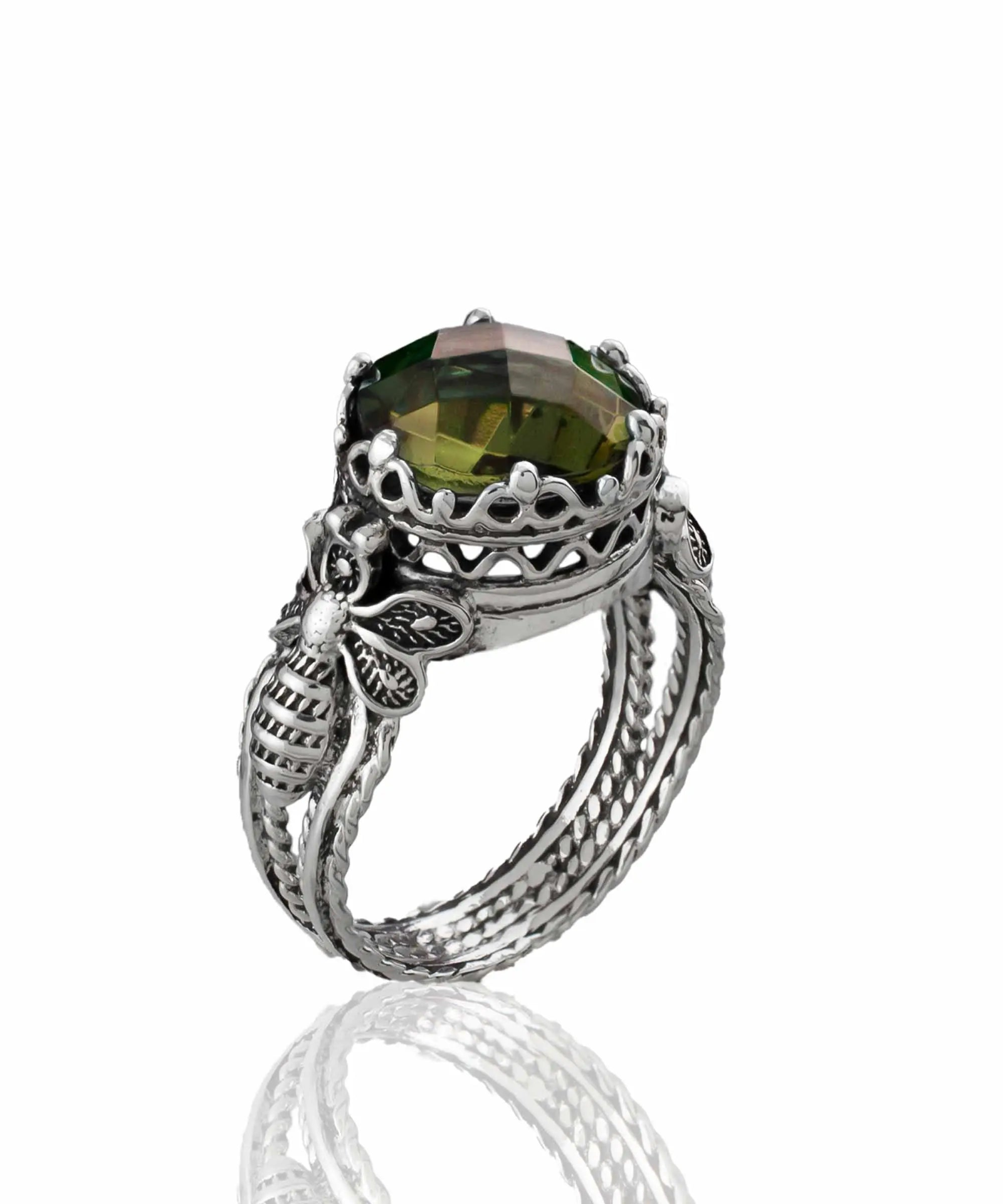 Silver cocktail ring featuring a detailed Alexandrite gemstone with filigree art design for women.